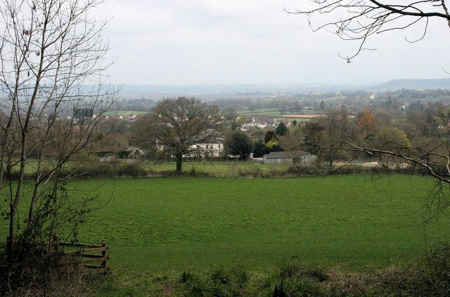 Blagdon Hill village seen across fields from the south-west, with the Vale of Taunton Deane beyond